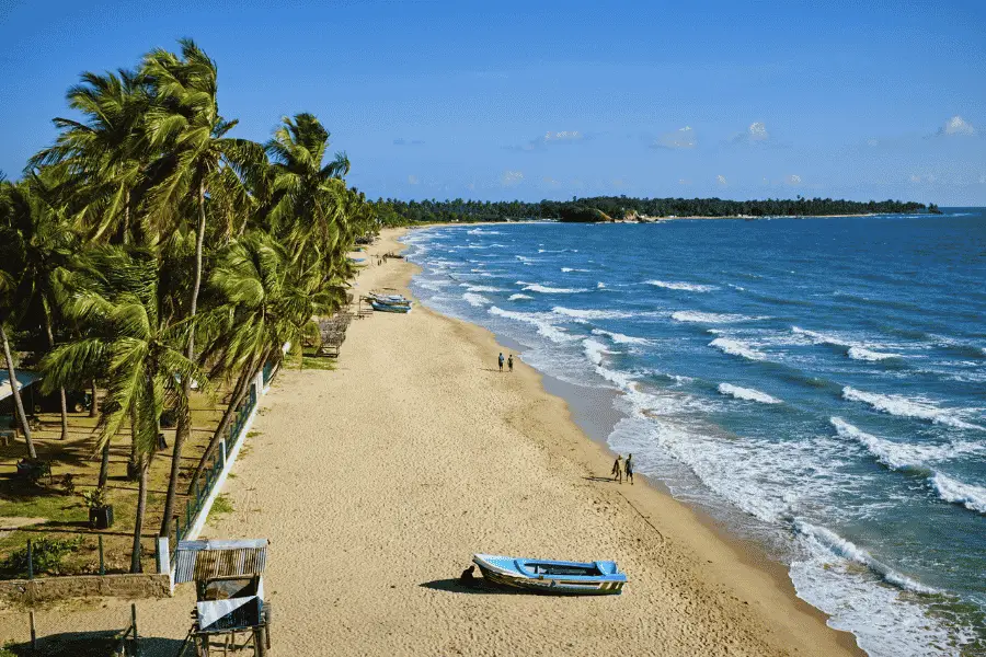 Nilaveli beach near Trincomalee — golden sand and calm turquoise water on Sri Lanka's east coast