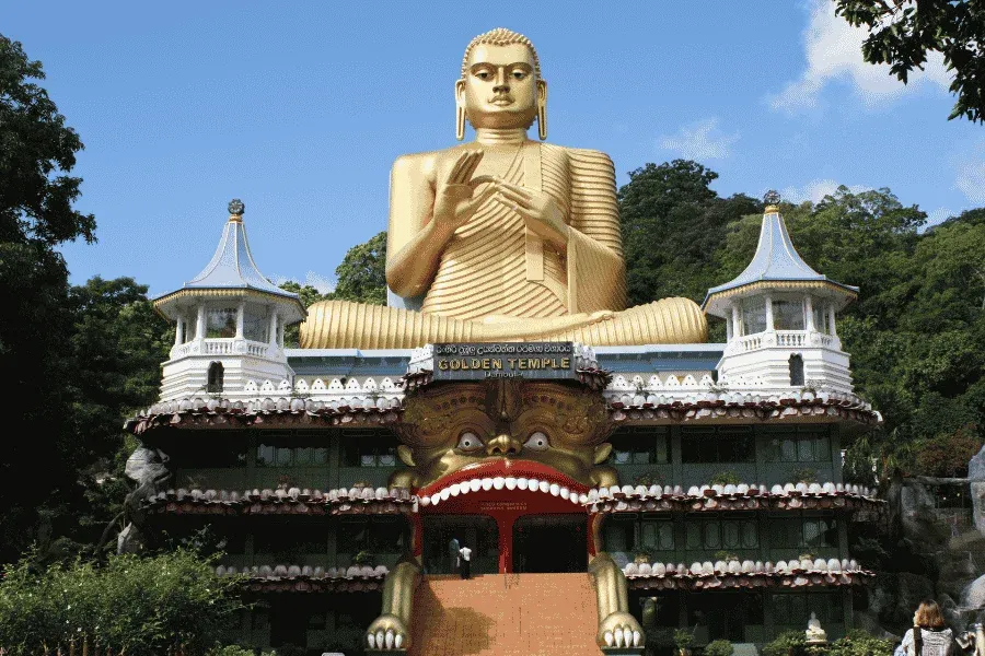Dambulla Cave Temple in Sri Lanka — ancient Buddhist cave murals and statues carved into the rock