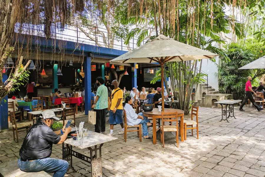 Street tea shop in Sri Lanka — local tea stalls are social gathering places serving milk tea and short eats throughout the day